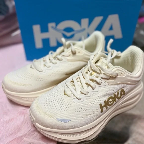 Hoka Women's Cream and Gold Bondi 9 Athletic Shoes - Picture 1 of 9